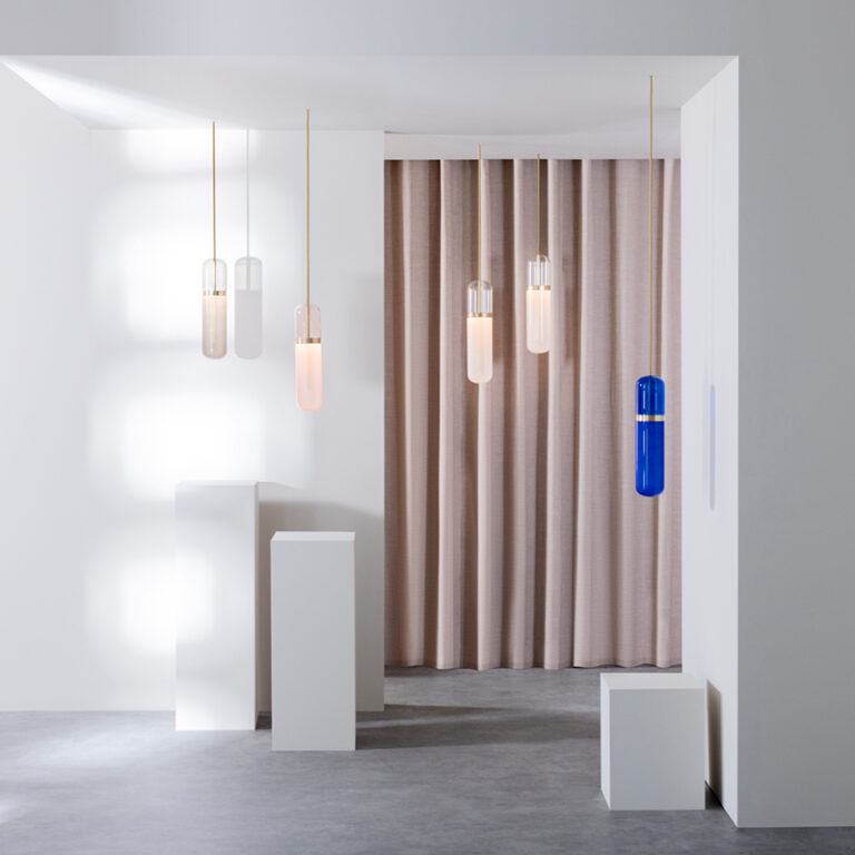 A series of Empty State light fittings in a minimal-style room setting